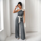 Elegant Women's Jumpsuit with Asymmetric Neckline and Decorative Waist Belt