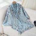 Women's Elegant Poncho with Fringe Details and Modern Plaid Pattern