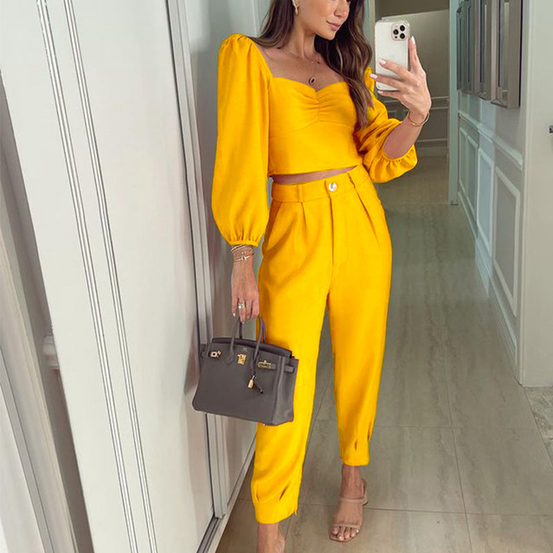 Elegant Women's Cropped Top and High-Waisted Trousers Set