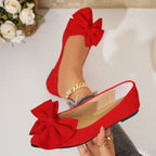 Ladies elegant lace ballerinas with large decorative bow and shimmering upper material