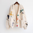 Women's Lined Knit Cardigan with Colorful Buttons and Unique Design