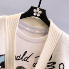 Women's Large Knit Cardigan with Playful Motif