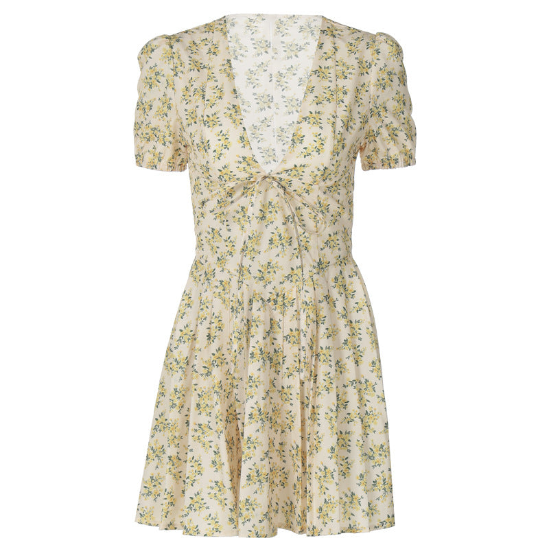 Women's Floral Mini Dress with Deep V-Neck and Playful Cut