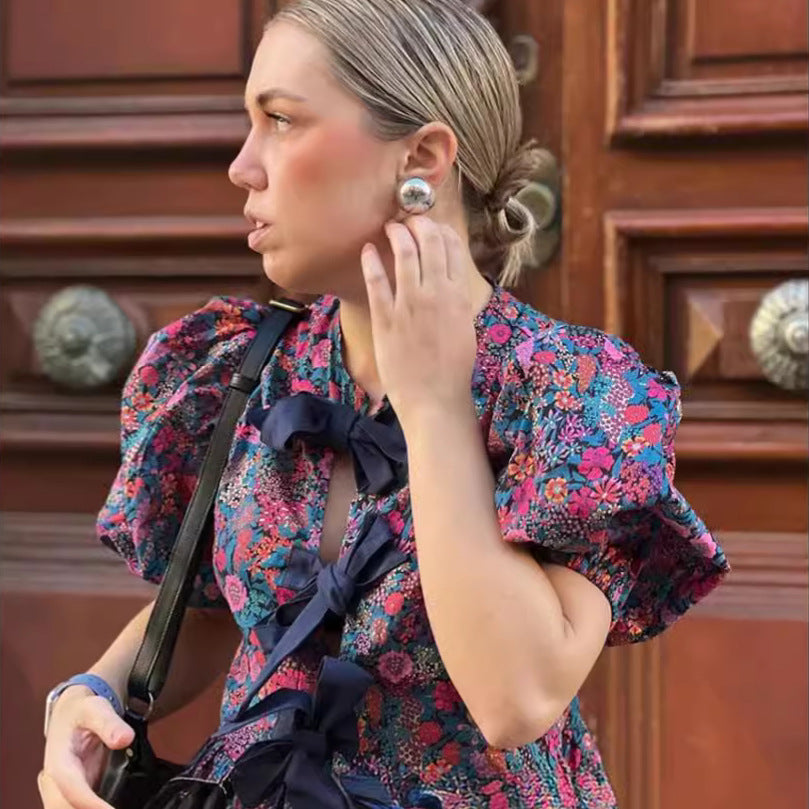Blouse with Voluminous Sleeves and Floral Patterns