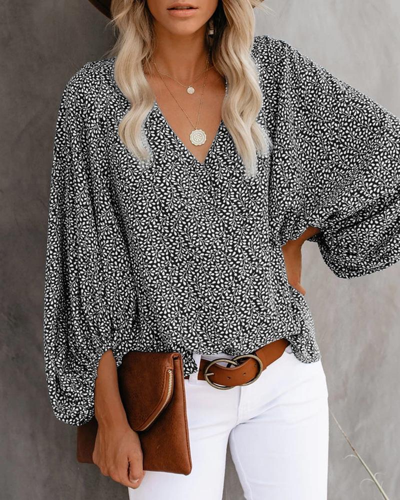 Women's Blouse with Wide Sleeves and Floral Pattern