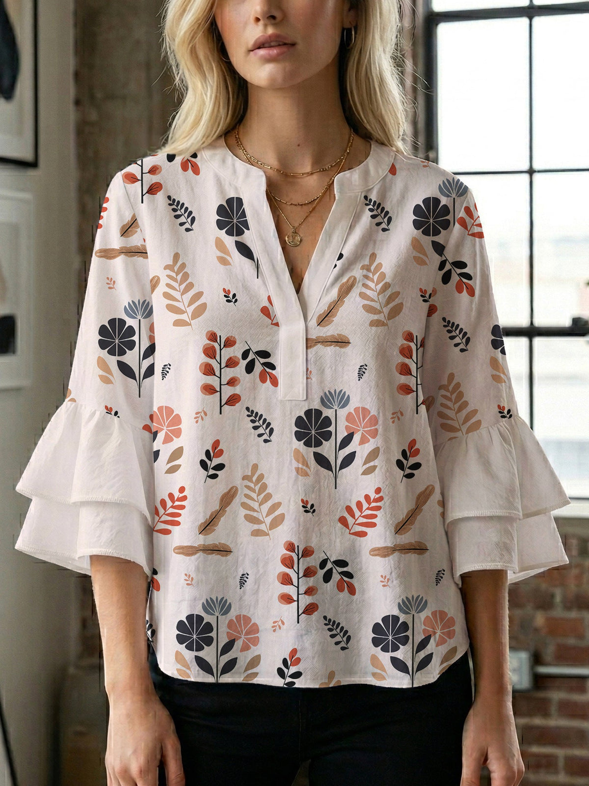 Women's Blouse with Voluminous Ruffle Sleeves and Modern Print