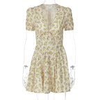 Women's Floral Mini Dress with Deep V-Neck and Playful Cut