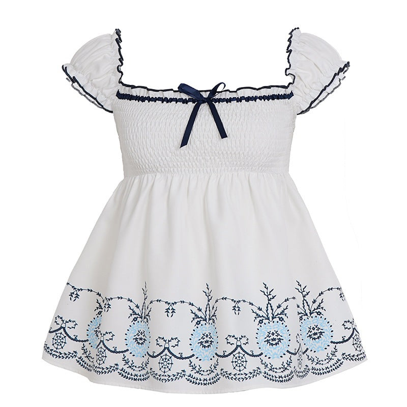 Women's Cotton Blouse with Floral Embroidery and Ruffled Hem
