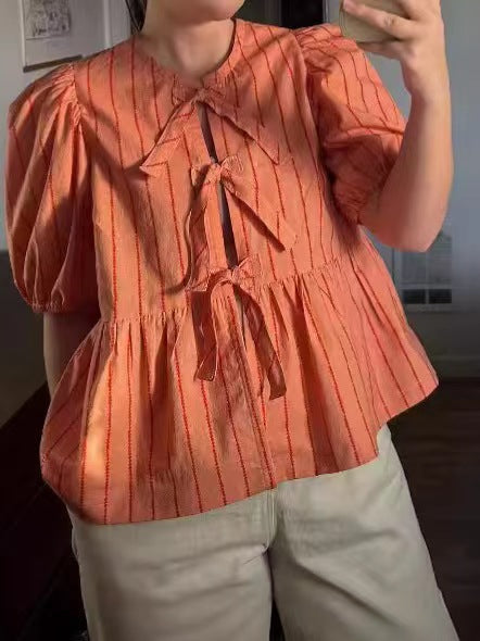 Women's Blouse with Ruffles and Bow Accents