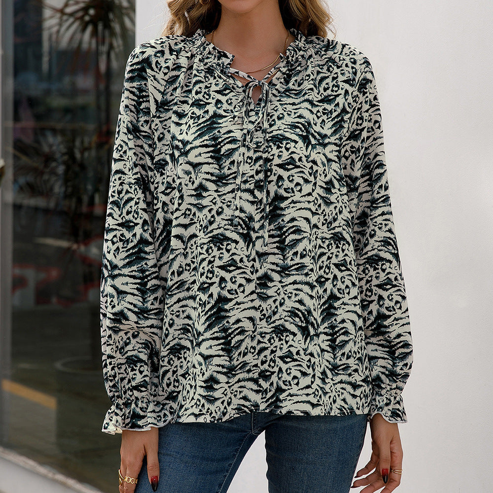 Women's Blouse with Unique Animal Print and Ruffle Details