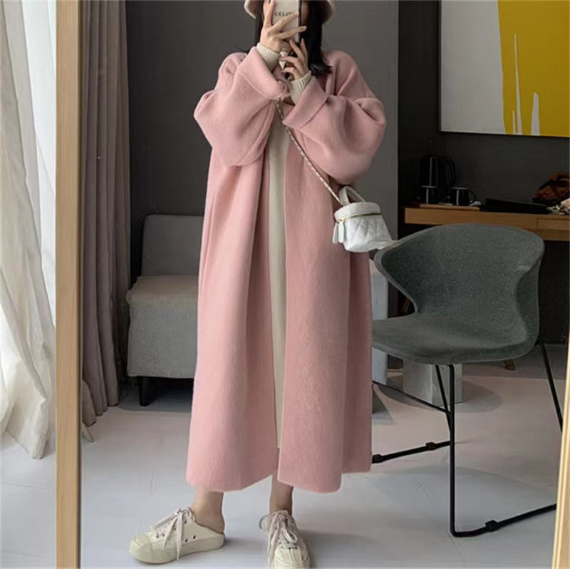 Women's Minimalist Long Wool Coat with Wide Cut and Elegant Details
