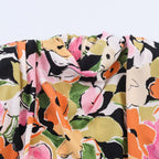 Women's Floral Blouse with Elegant Knot Detail
