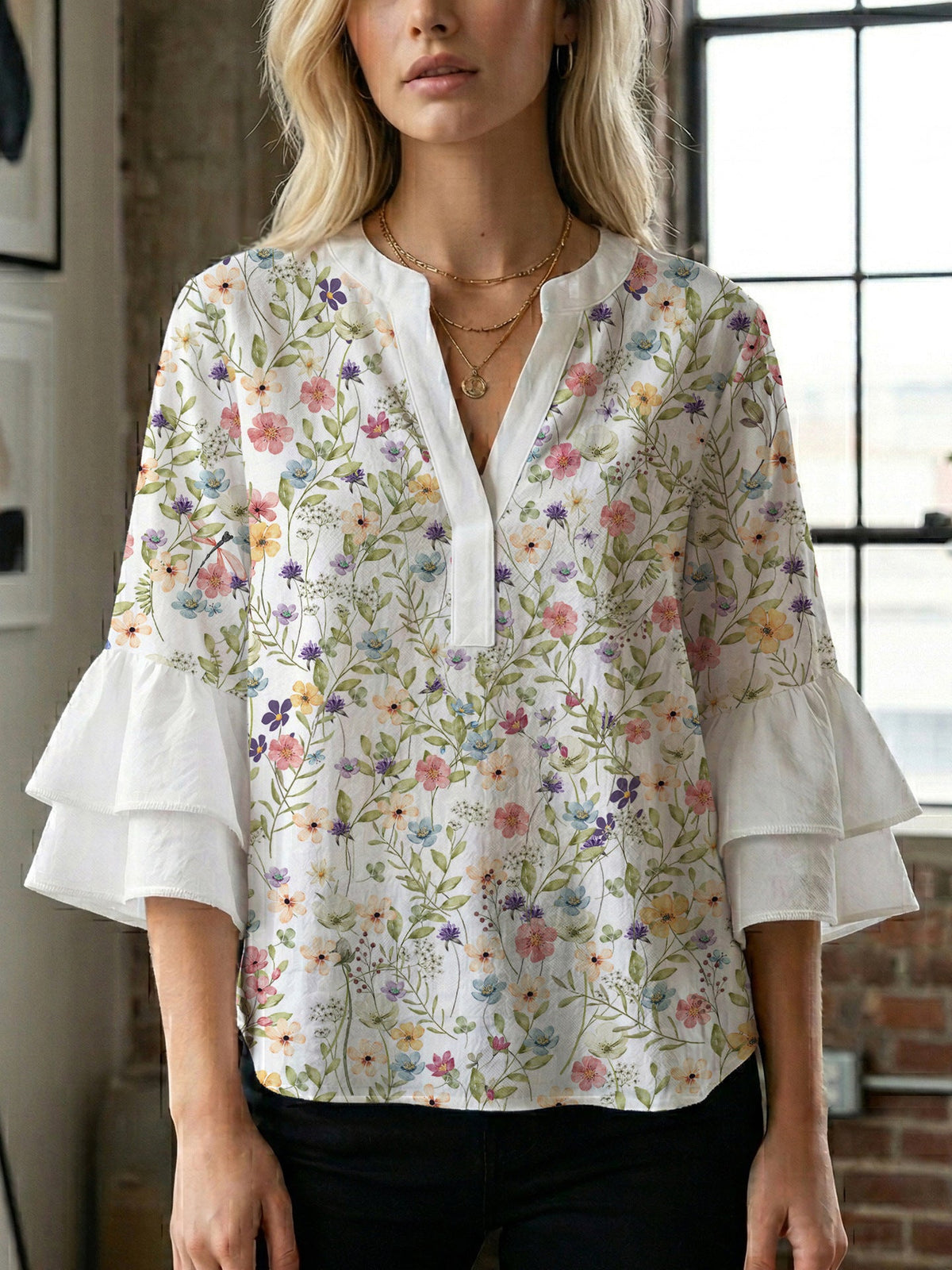 Women's Blouse with Voluminous Sleeves and Floral Design