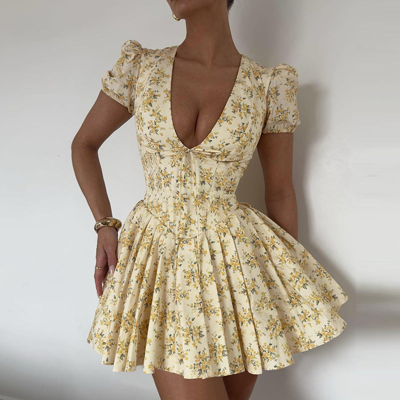 Women's Floral Mini Dress with Deep V-Neck and Playful Cut