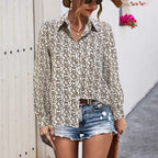 Elegant Women's Blouse with Modern Graphic Pattern and Deep Round Neckline