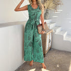 Elegant Jumpsuit with Tie Belt and Modern Graphic Design