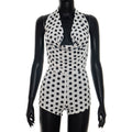 Elegant Playsuit with Deep V-Neck and Modern Polka Dot Pattern