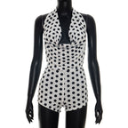 Elegant Playsuit with Deep V-Neck and Modern Polka Dot Pattern